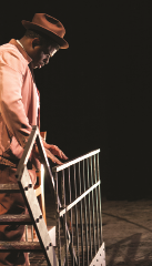 Khary Moye as the narrator, discovering bloody prints (U.S. production)
